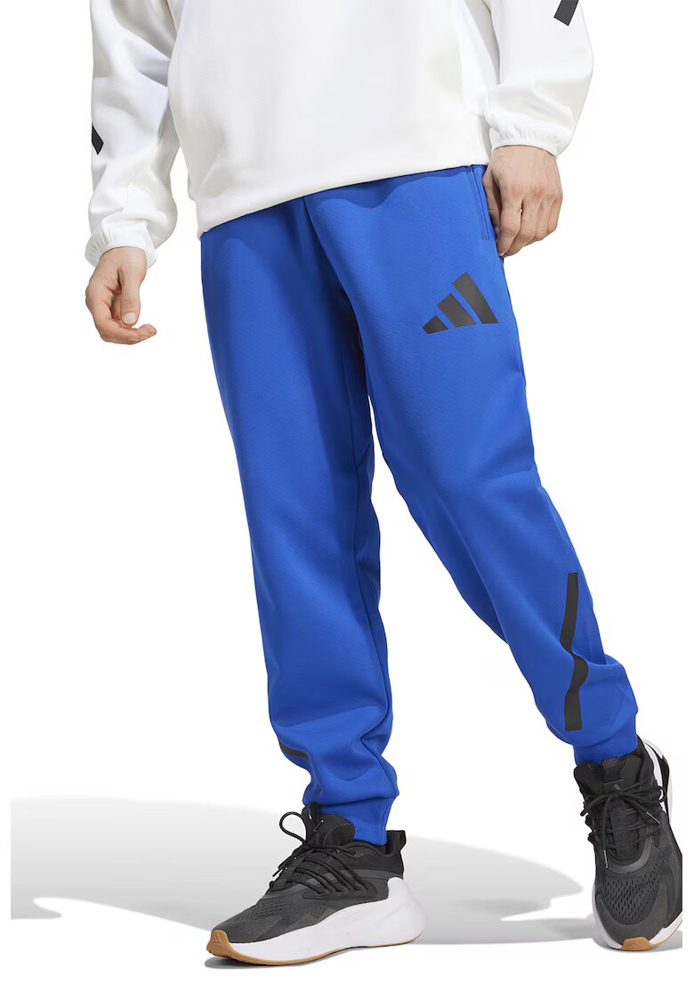 ADIDAS SPORTSWEAR Pantaloni de trening relaxed fit cu snur Z.N.E. - Negru/Albastru royal