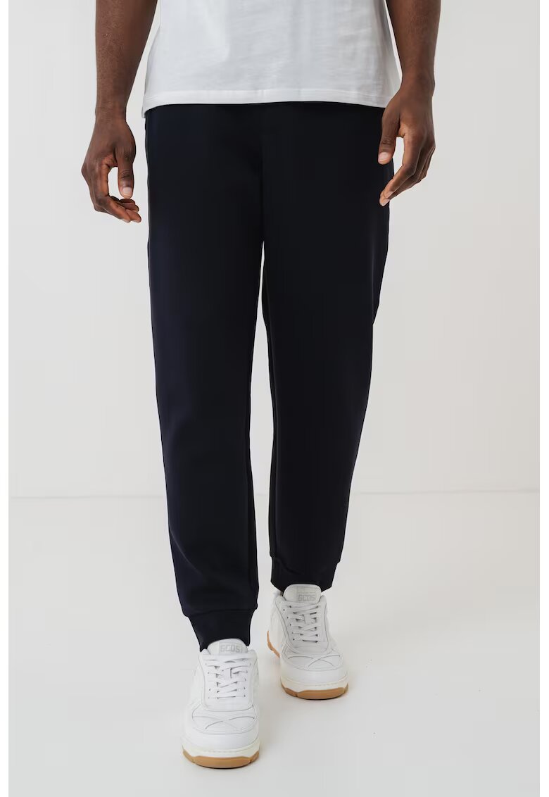 Armani Exchange Pantaloni conici de trening - Albastru ultramarin