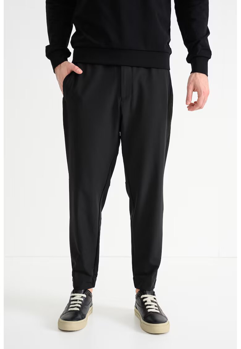 Boss Pantaloni de trening cu croiala conica Flex - Negru