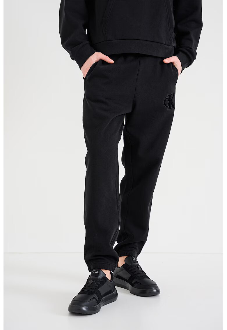 Calvin Klein Jeans Pantaloni de trening din bumbac cu snur de ajustare - Negru