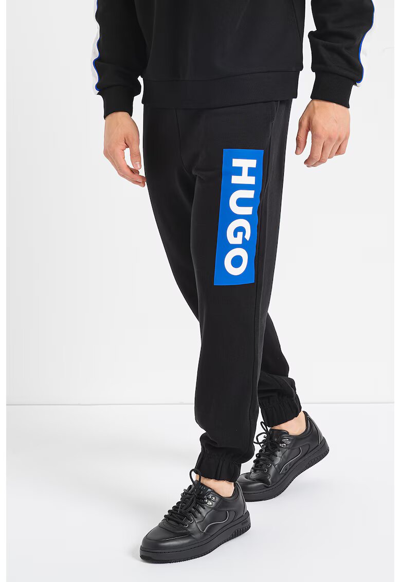 Hugo Pantaloni de trening relaxed fit Nuram - Negru