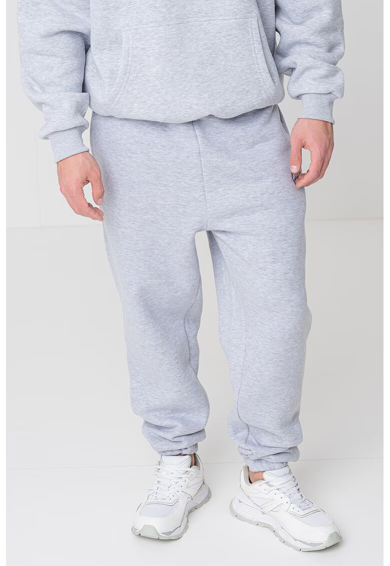 Karl Kani Pantaloni de trening regular fit Small Signature Essential - Negru/Gri deschis melange