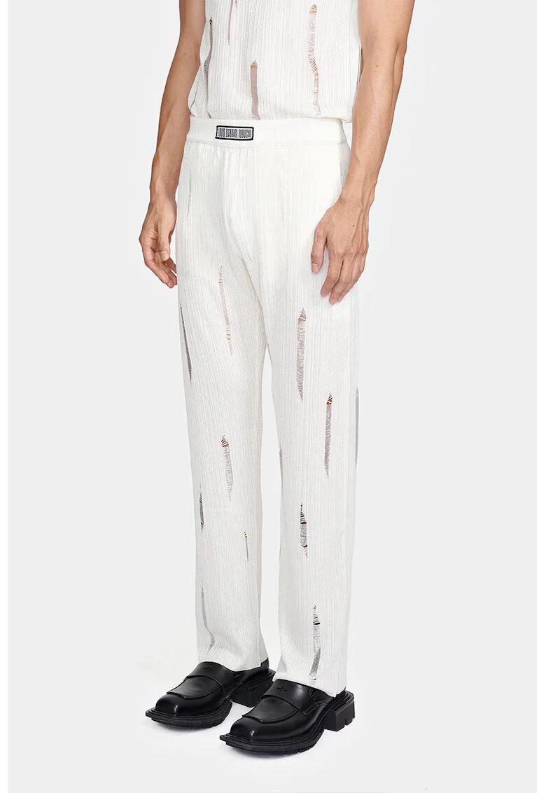 LOUIS GABRIEL NOUCHI Pantaloni evazați din tricot - cu transparență discretă nervurată și logo frontal - Alb