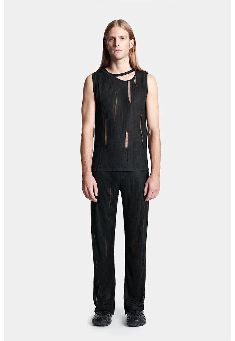 LOUIS GABRIEL NOUCHI Pantaloni evazați din tricot - cu transparenta discreta nervurata și logo frontal LG