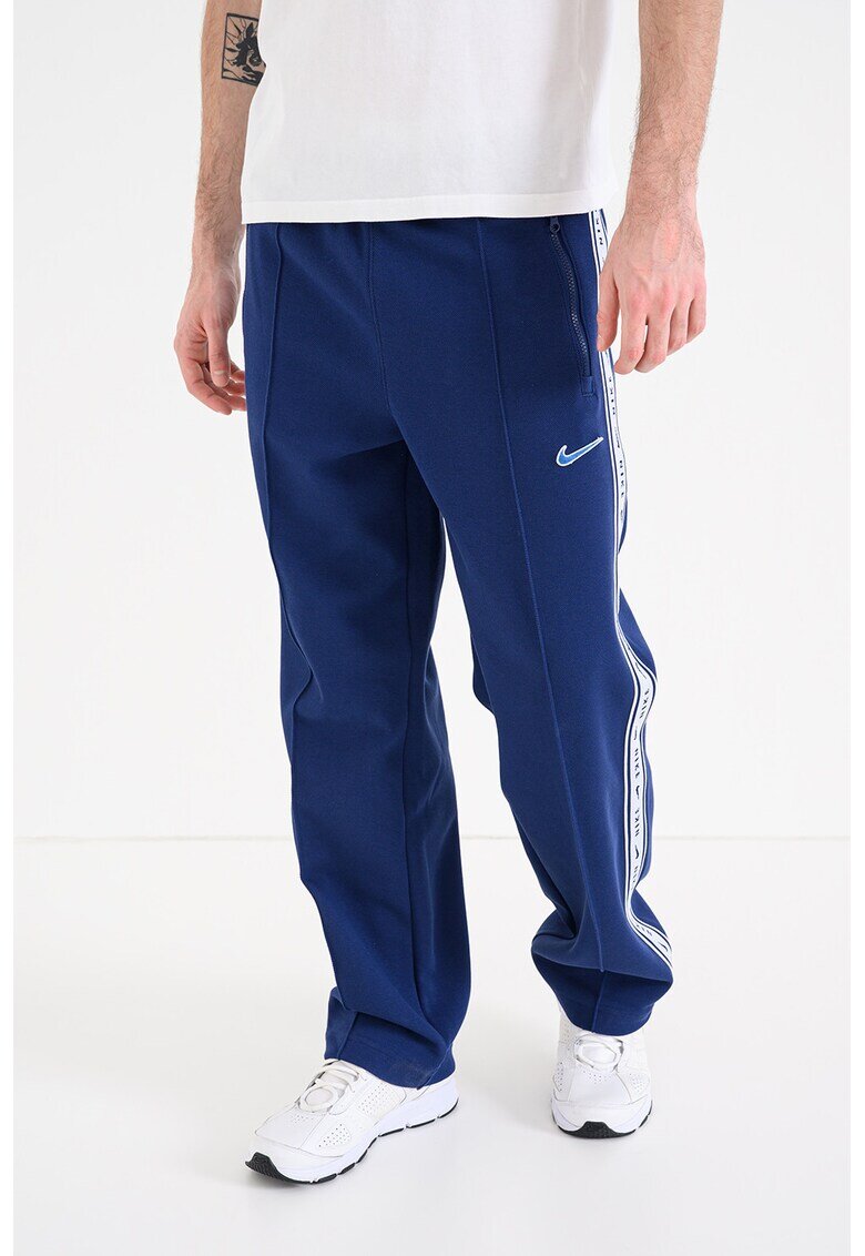 Nike Pantaloni de trening cu banda logo si buzunare cu fermoar - Bleumarin
