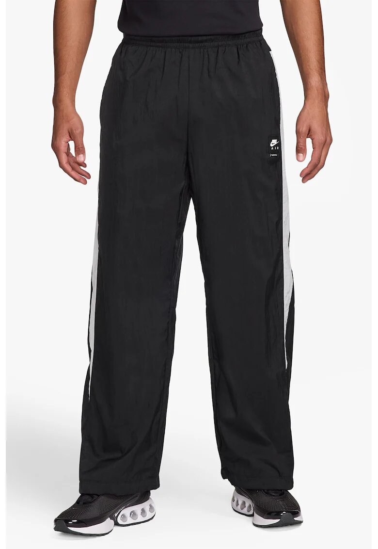 Nike Pantaloni de trening cu buzunare cu fermoar si snururi la terminatie - Alb/Negru