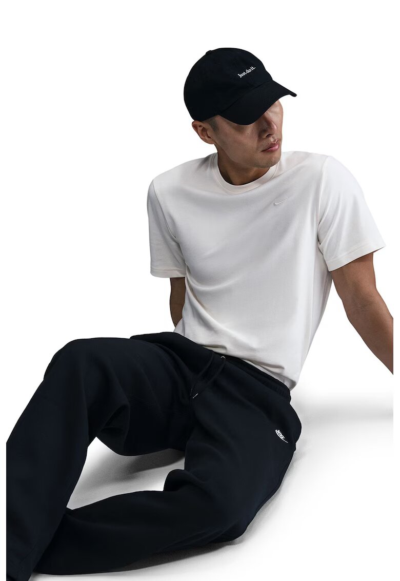 Nike Pantaloni de trening cu buzunare laterale - Negru/Alb optic