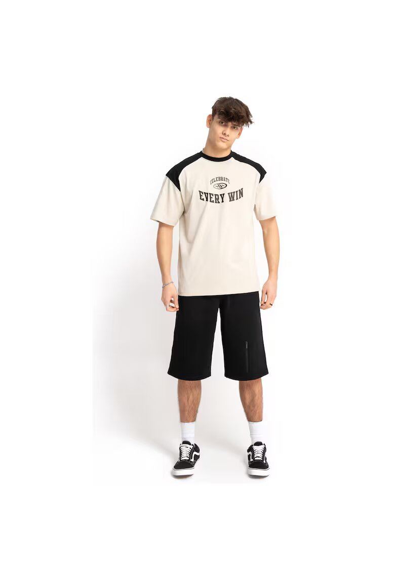 R Pantaloni scuti de tening cu buzuna pe picio