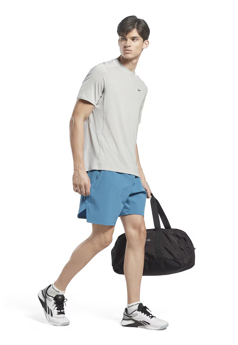 Reebok Pantaloni scurti cu buzunare cu fermoar - pentru fitness Strength - Albastru