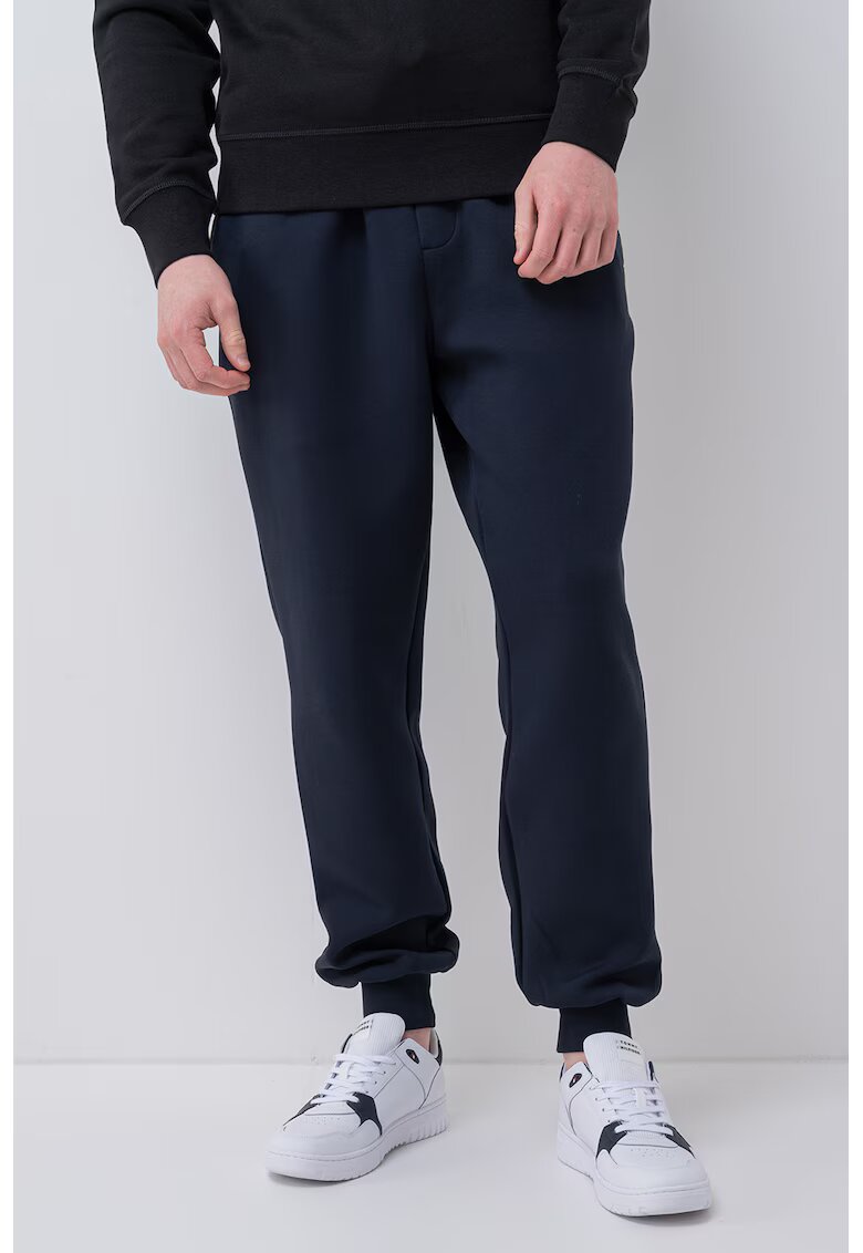 Tommy Hilfiger Pantaloni de trening din amestec de bumbac cu snur de ajustare - Bleumarin