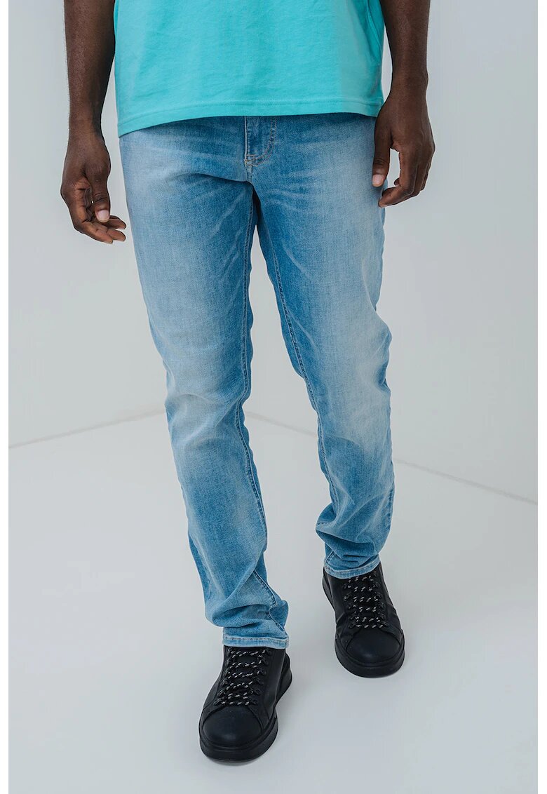 Tommy Jeans Blugi cu aspect decolorat - Albastru deschis
