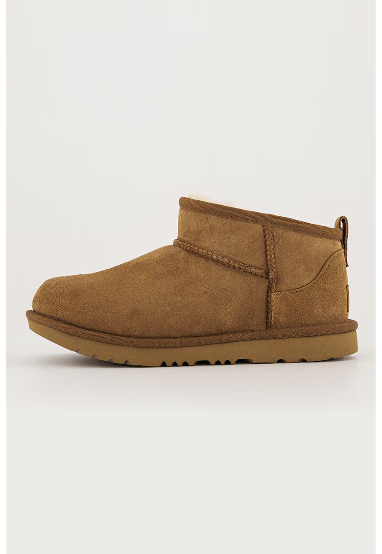 UGG Ghete slip-on rezistente la apa din piele intoarsa Classic Ultra Mini - Galben inchis