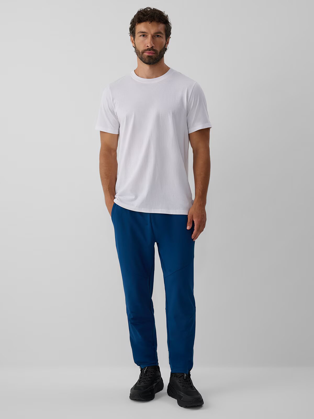 4F Pantaloni de trening din material tehnic pentru bărbați - M