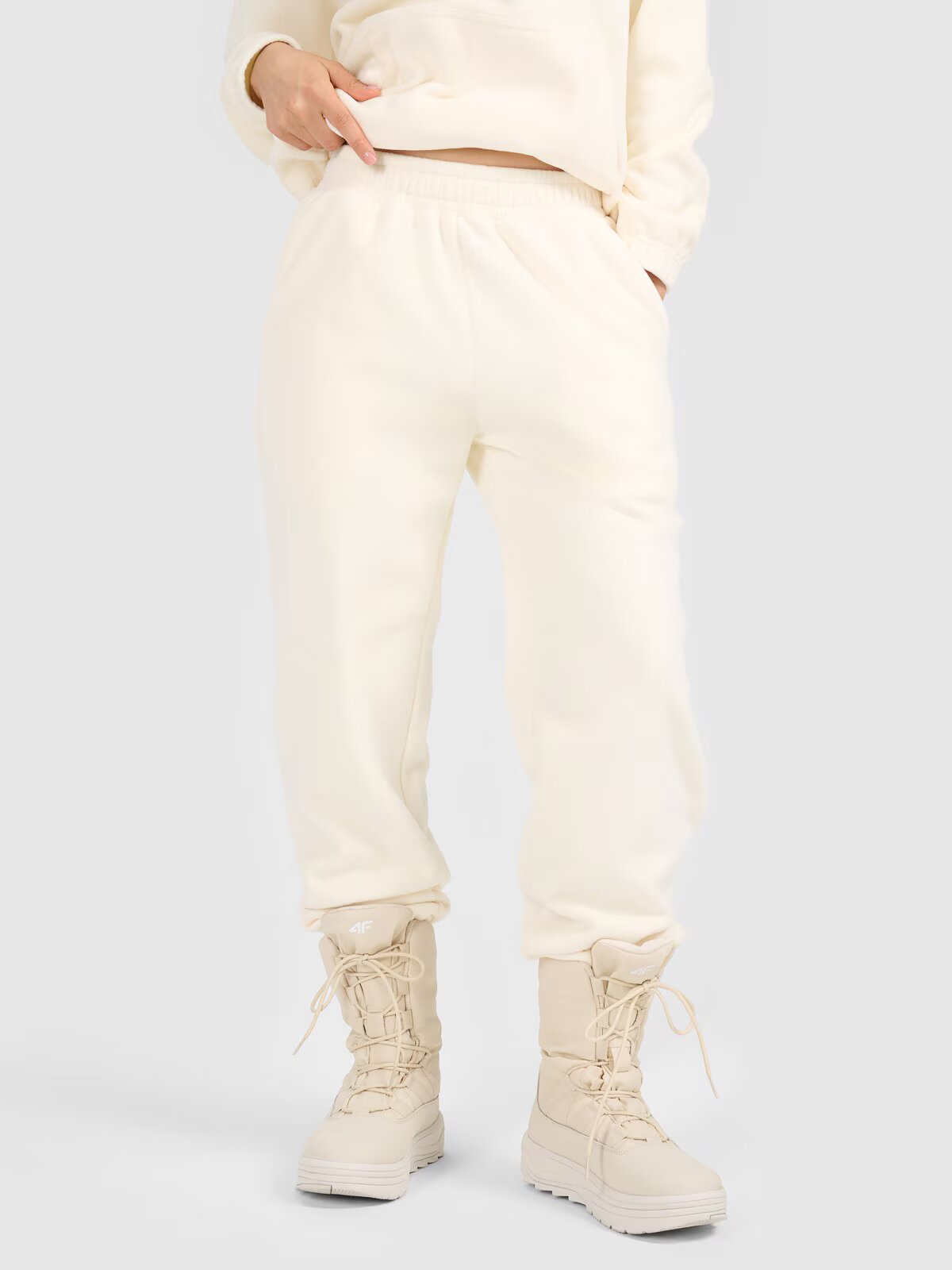 4F Pantaloni din polar de trening pentru femei - albi M