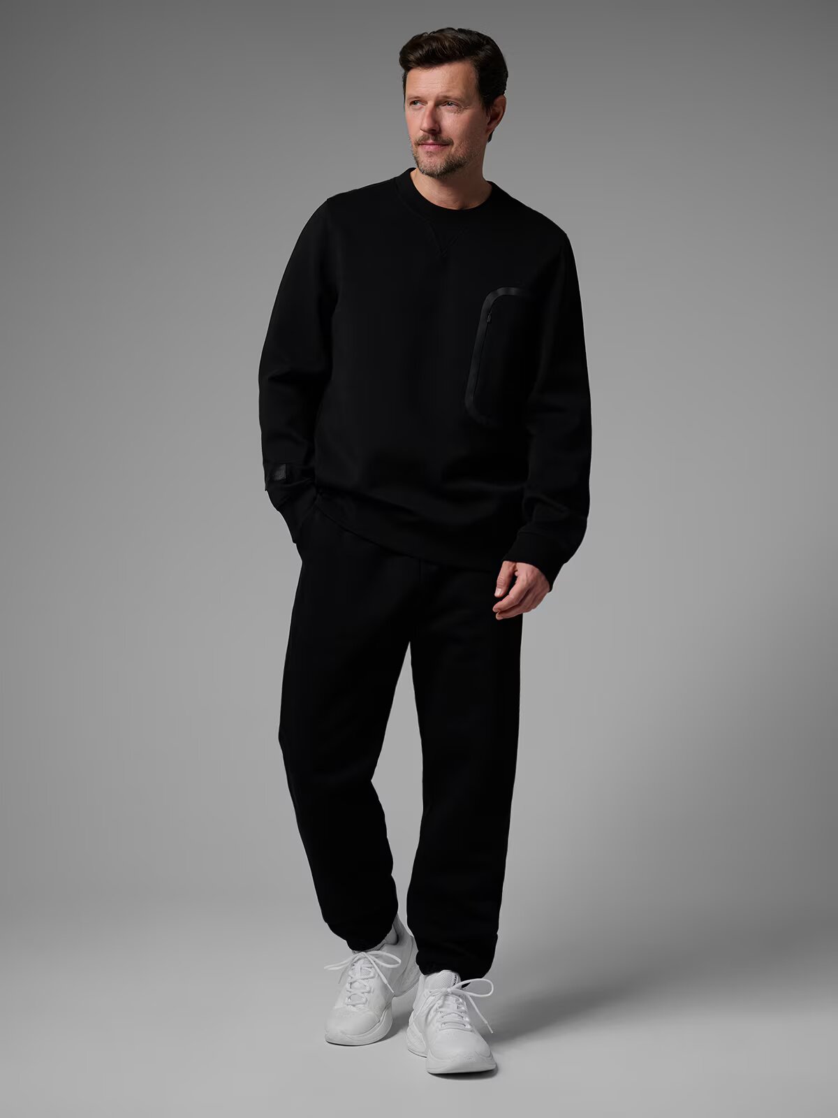 4F Pantaloni jogger de trening pentru bărbați x Robert Lewandowski - negri S