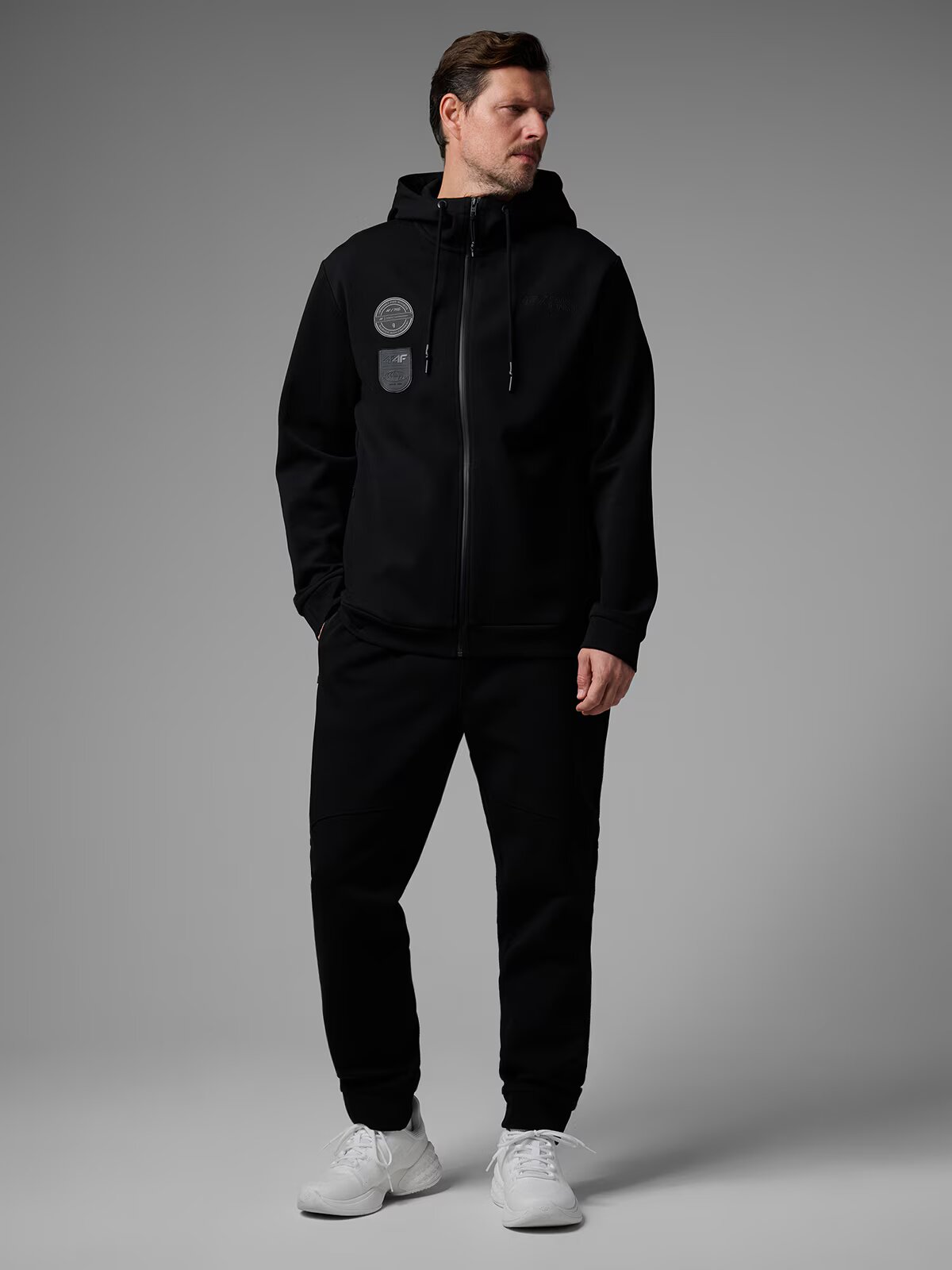 4F Pantaloni jogger de trening pentru bărbați x Robert Lewandowski - negri S