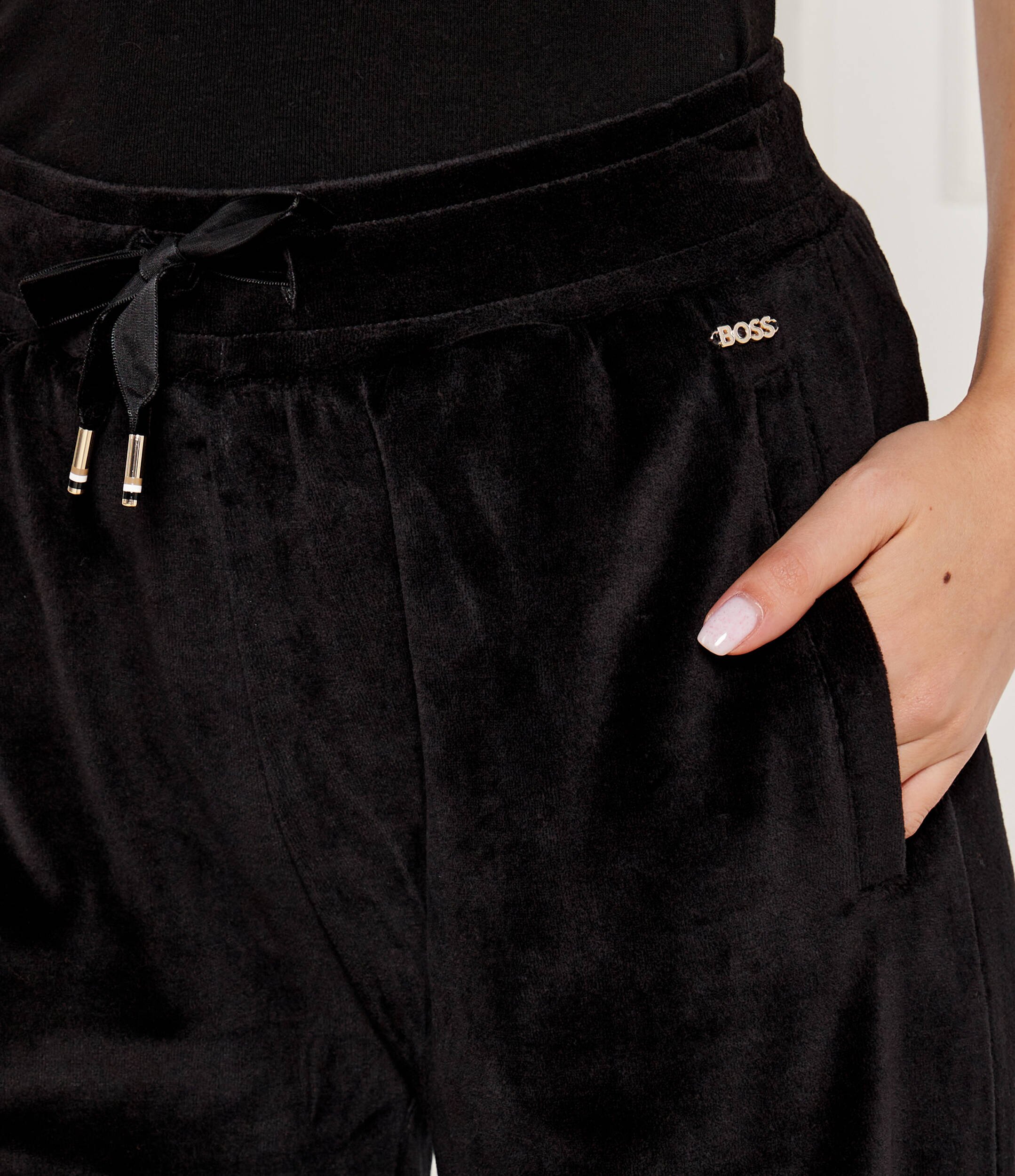 BOSS Black Pantaloni de trening Velluto | flare fit