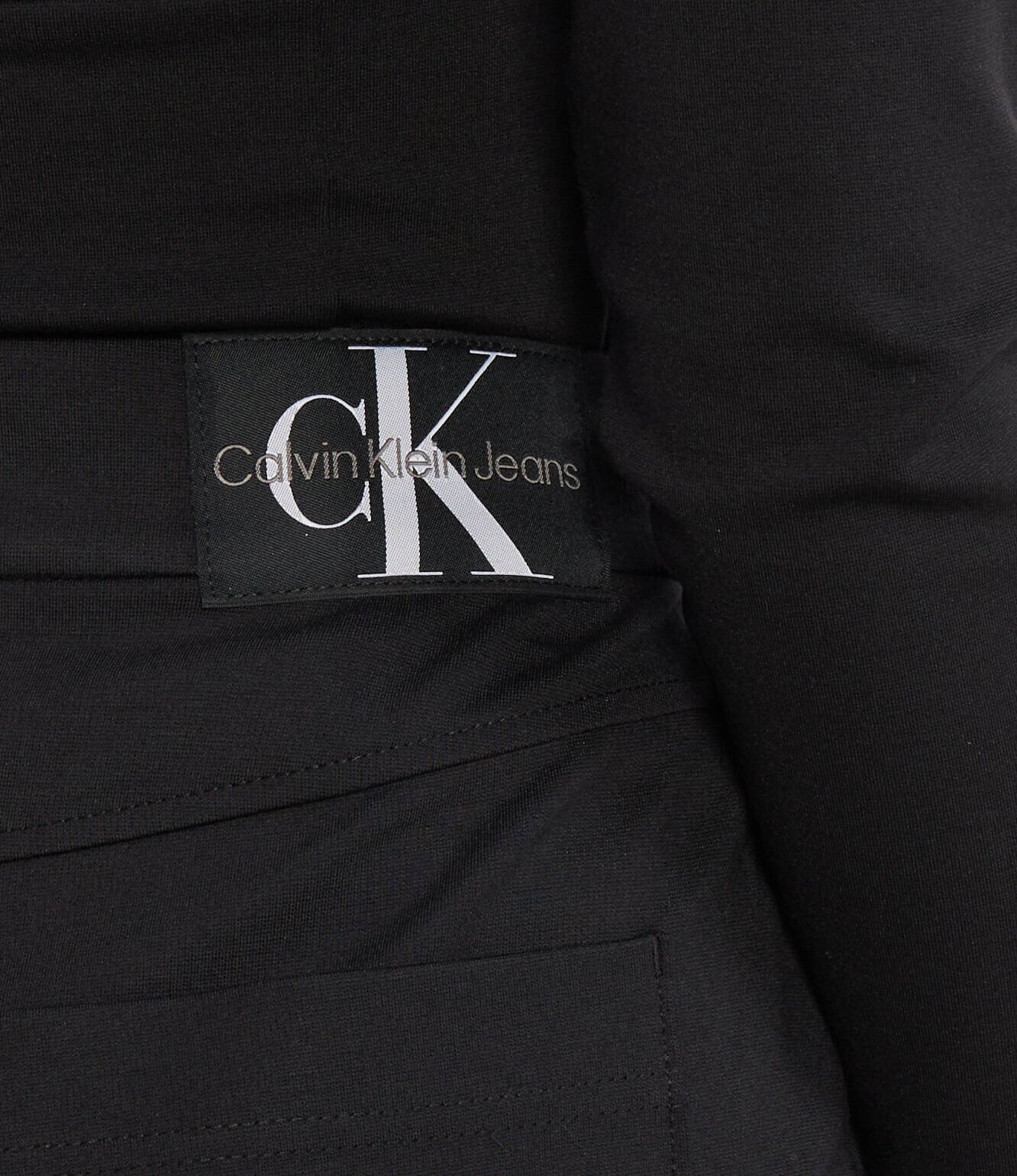 Calvin Klein Jeans Pantaloni de trening MILANO | flare fit