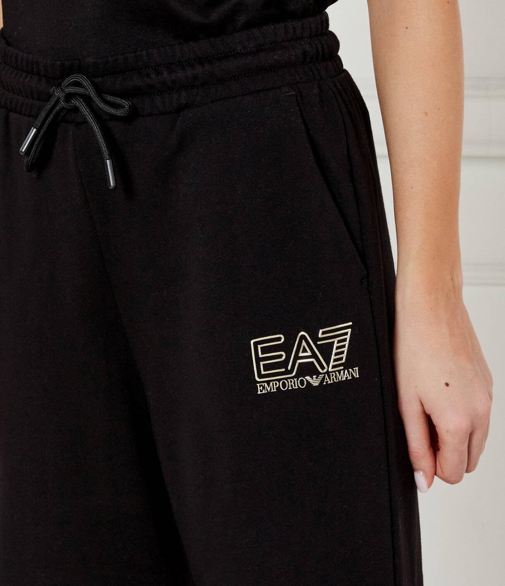 EA7 Pantaloni de trening | flare fit