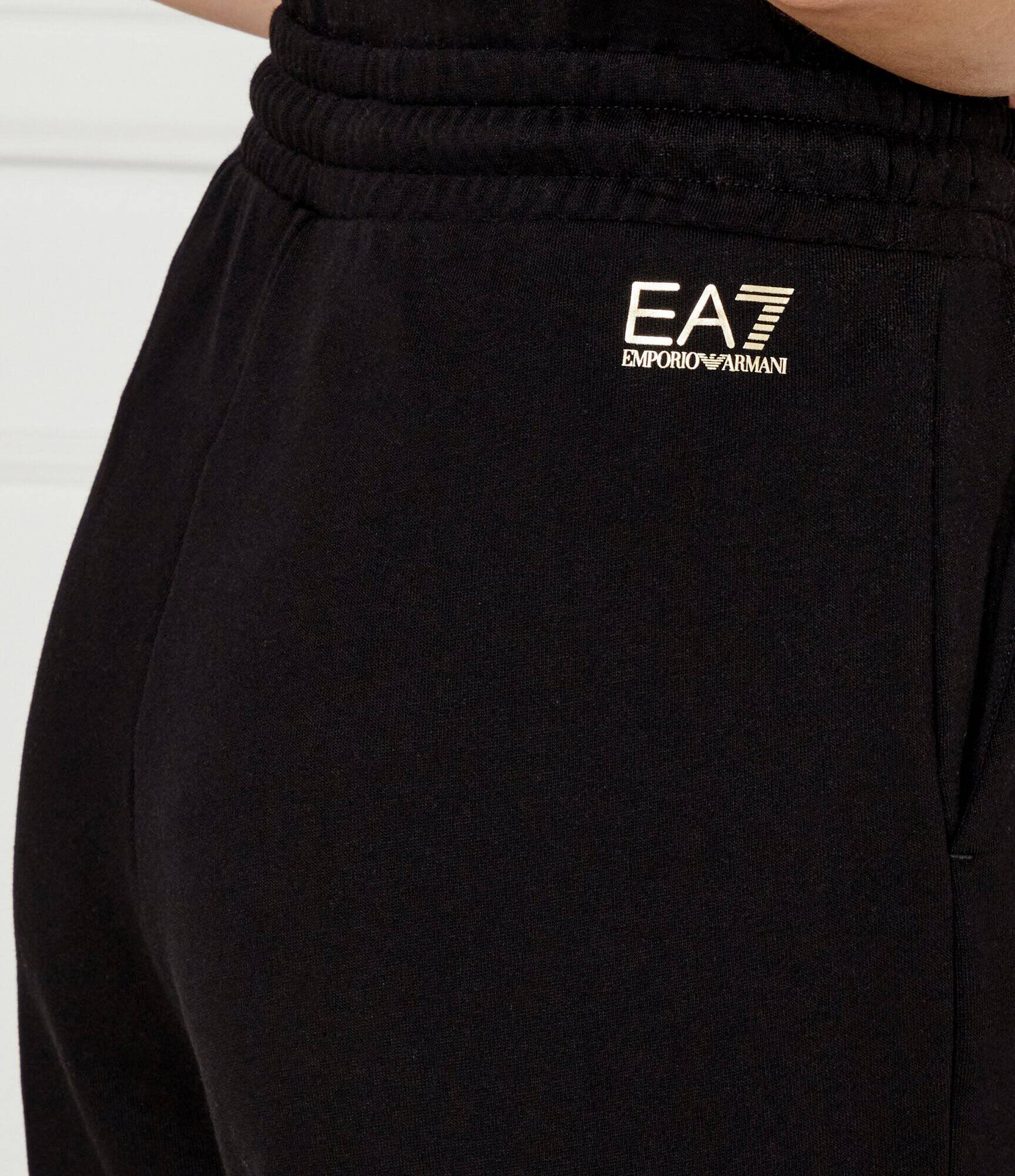 EA7 Pantaloni de trening | flare fit