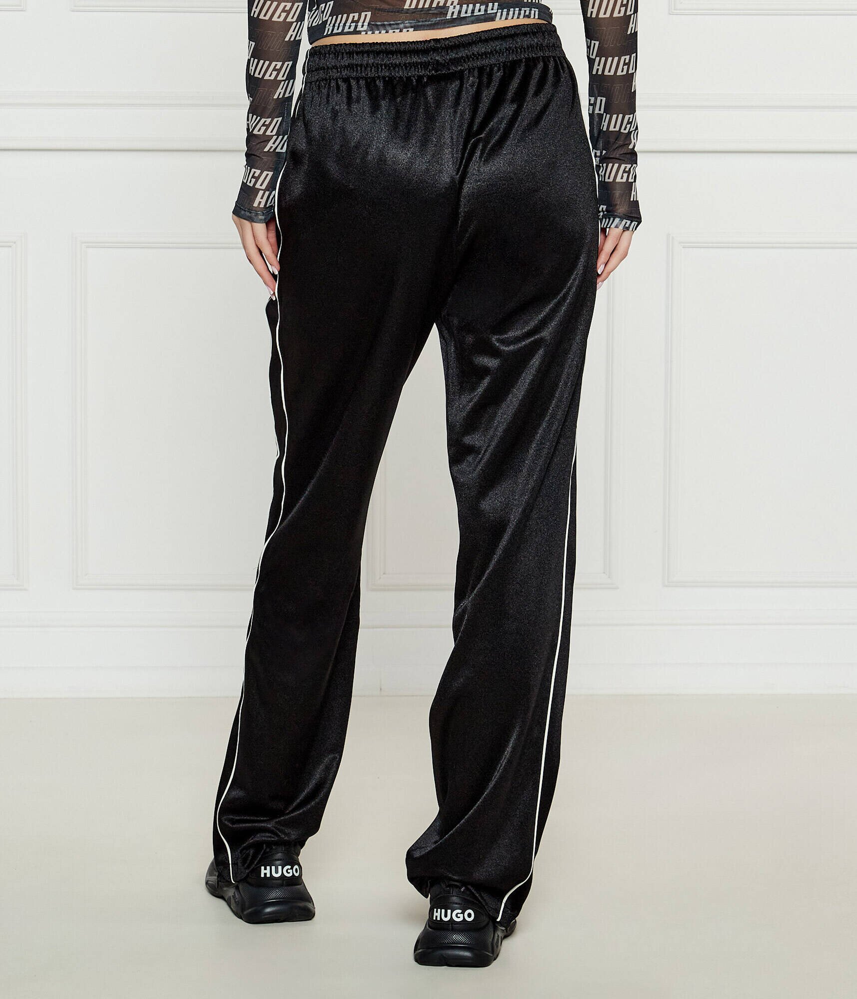 Hugo Pantaloni de trening Neannet | flare fit
