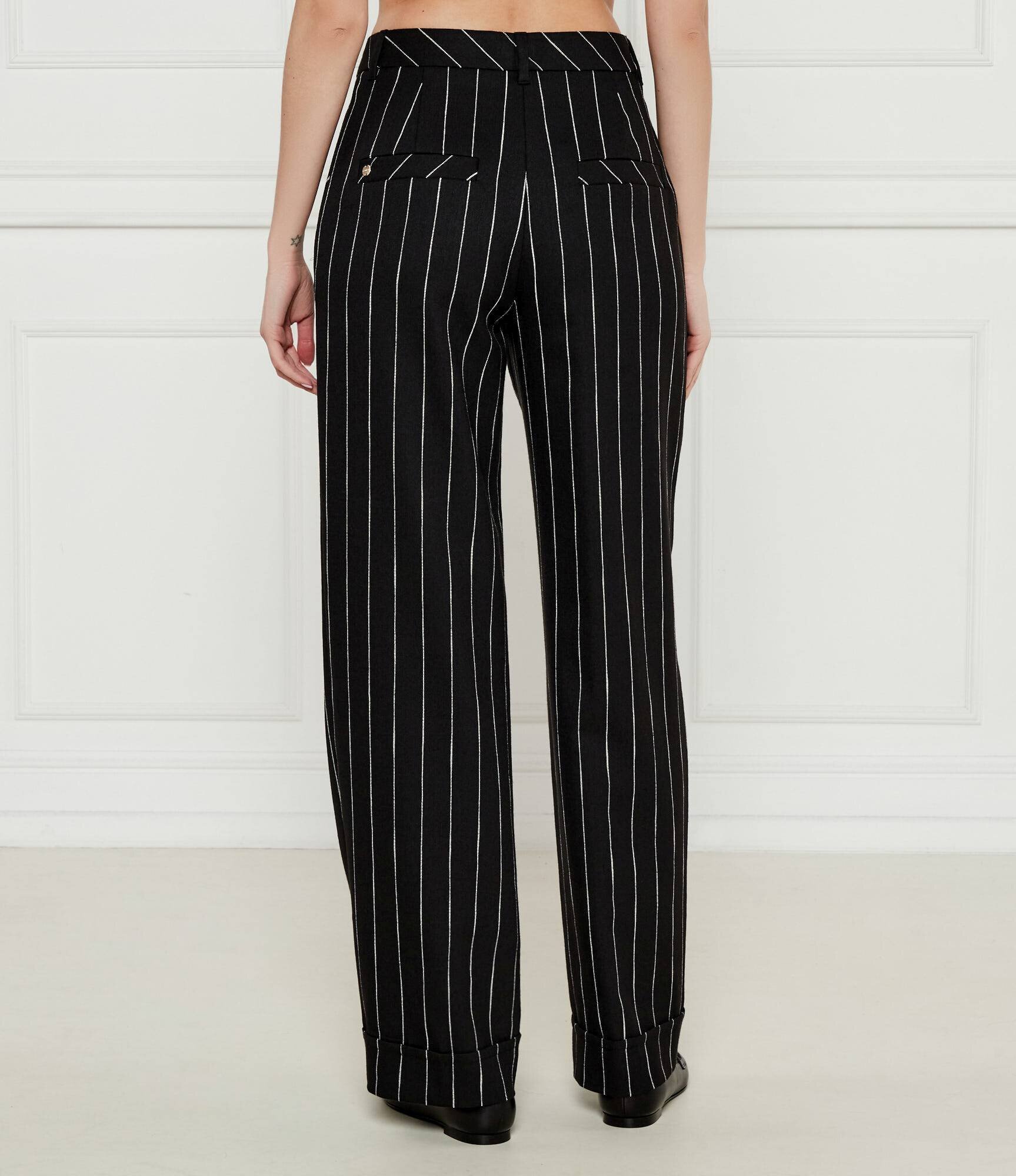 Marc Cain Pantaloni | flare fit | cu adaos de in