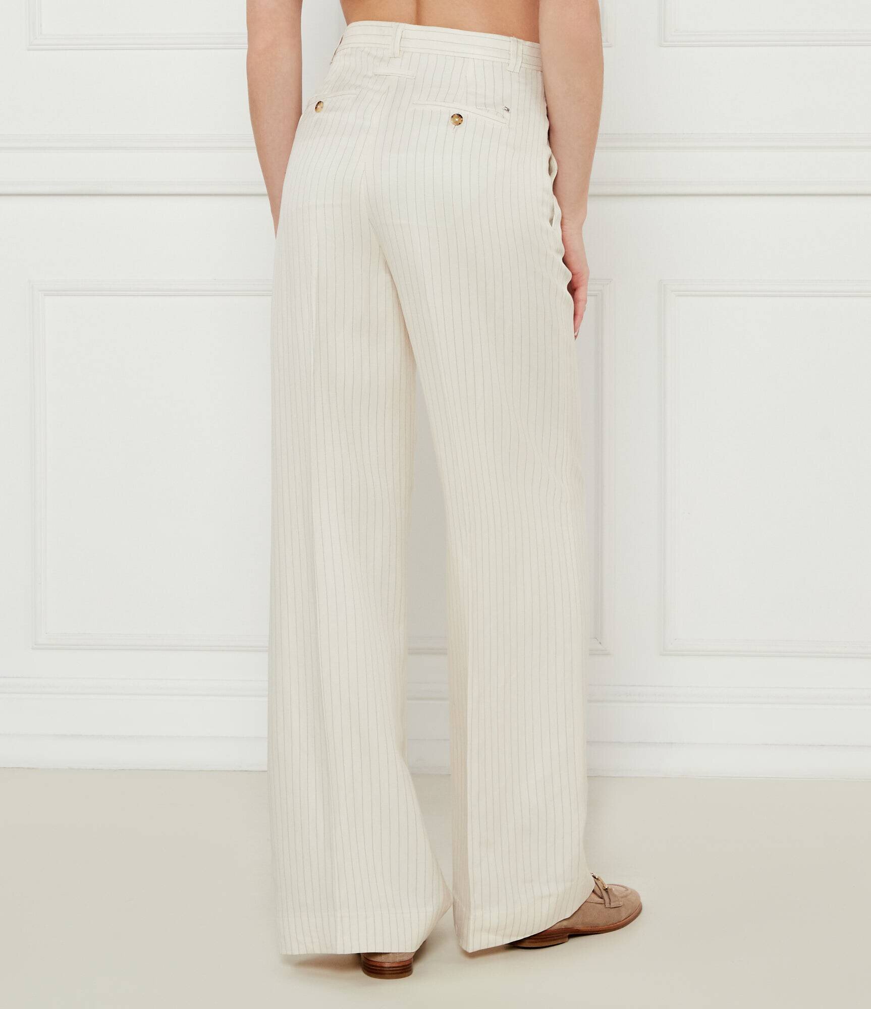 Tommy Hilfiger Pantaloni | flare fit | cu adaos de in