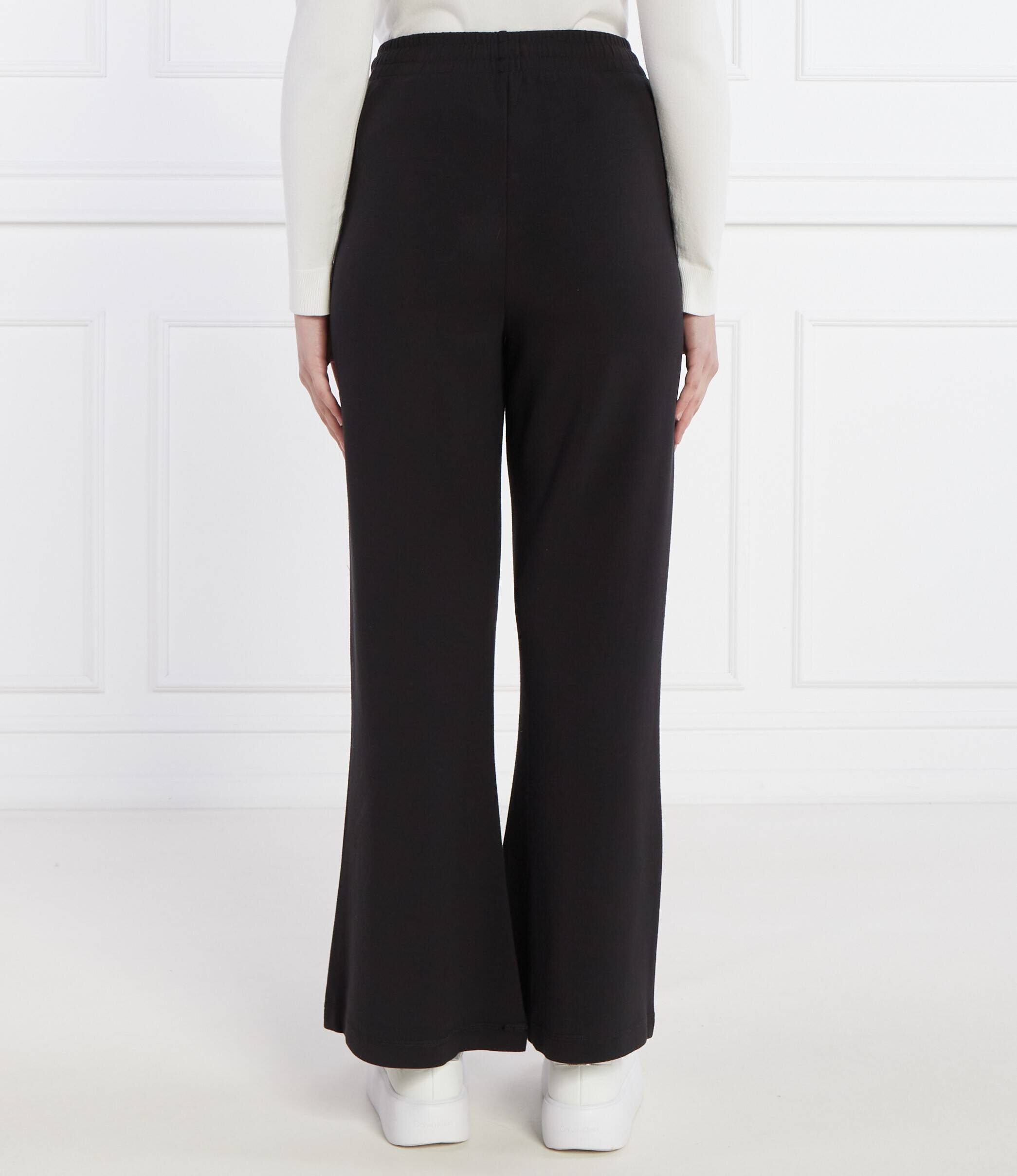 Tommy Jeans Pantaloni de trening BADGE WIDE EXT | flare fit