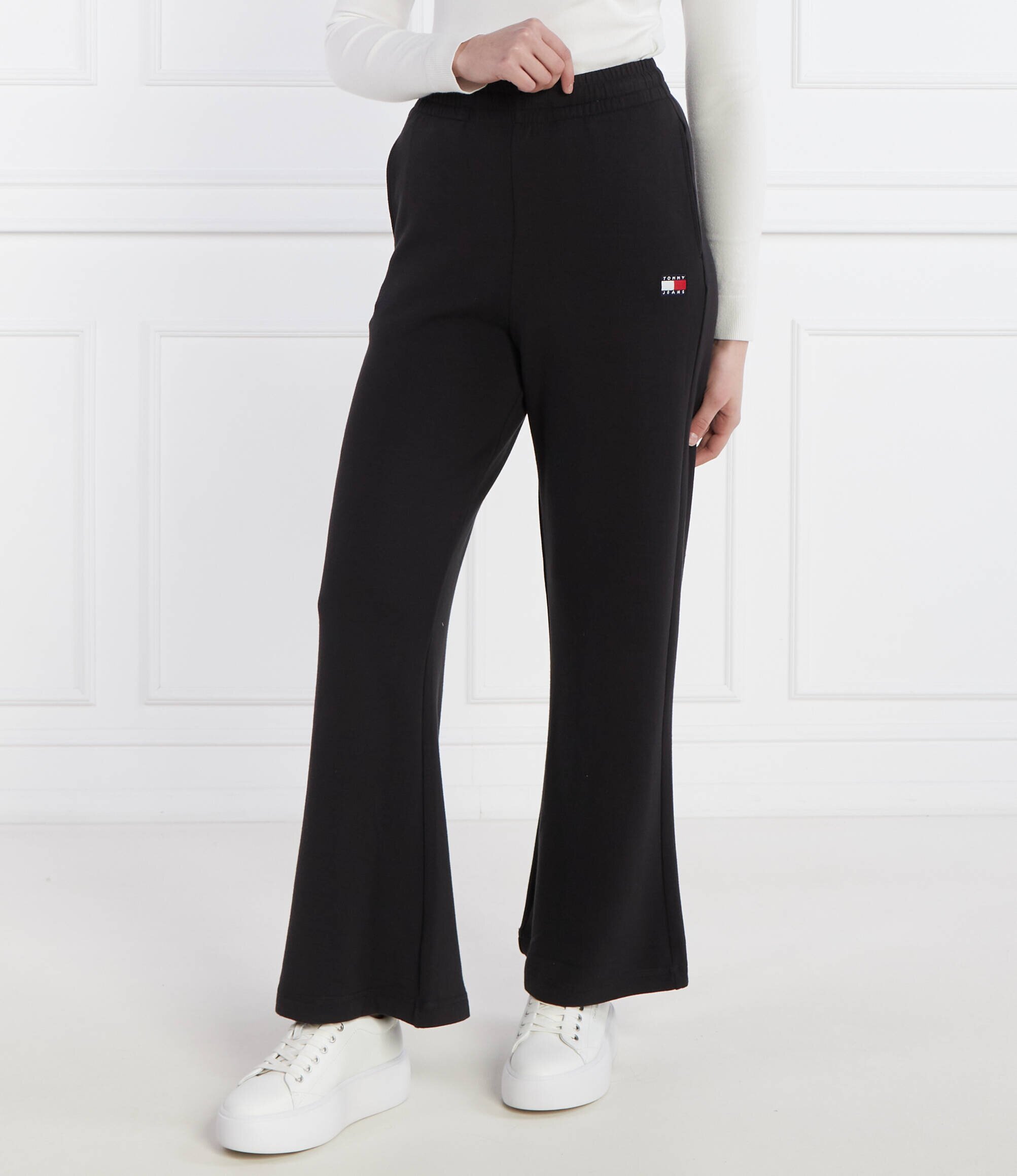 Tommy Jeans Pantaloni de trening BADGE WIDE EXT | flare fit