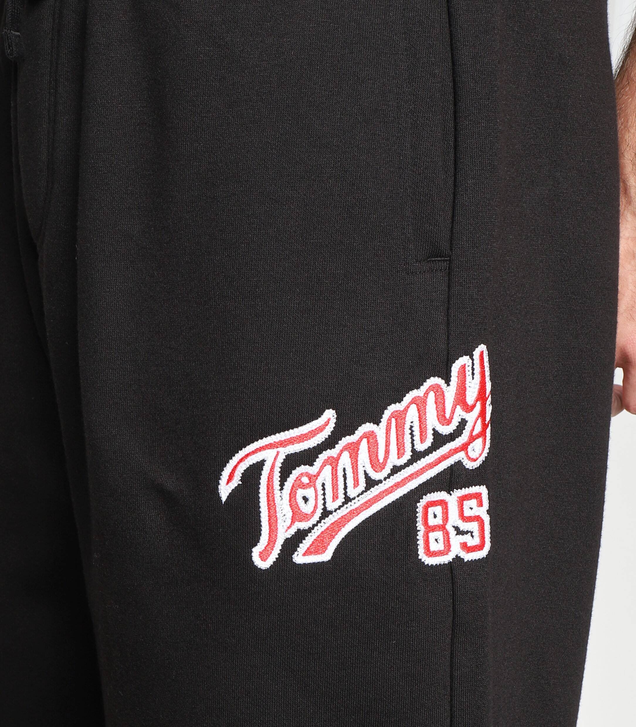Tommy Jeans Pantaloni de trening COLLEGE 85 | Regular Fit