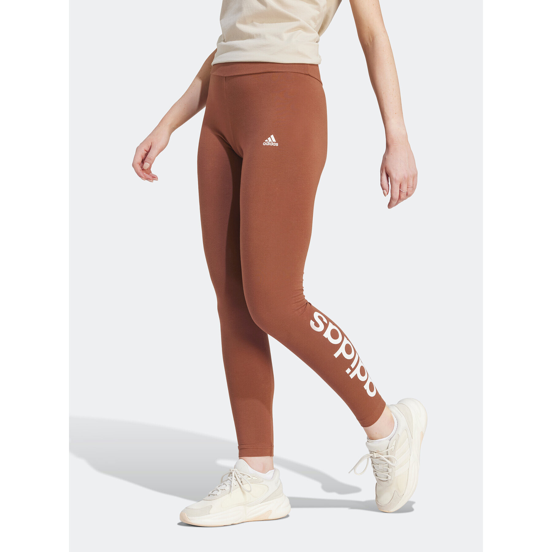 adidas Colanți ESSENTIALS HIGH-WAISTED LOGO IM2858 Maro Tight Fit - Pled.ro