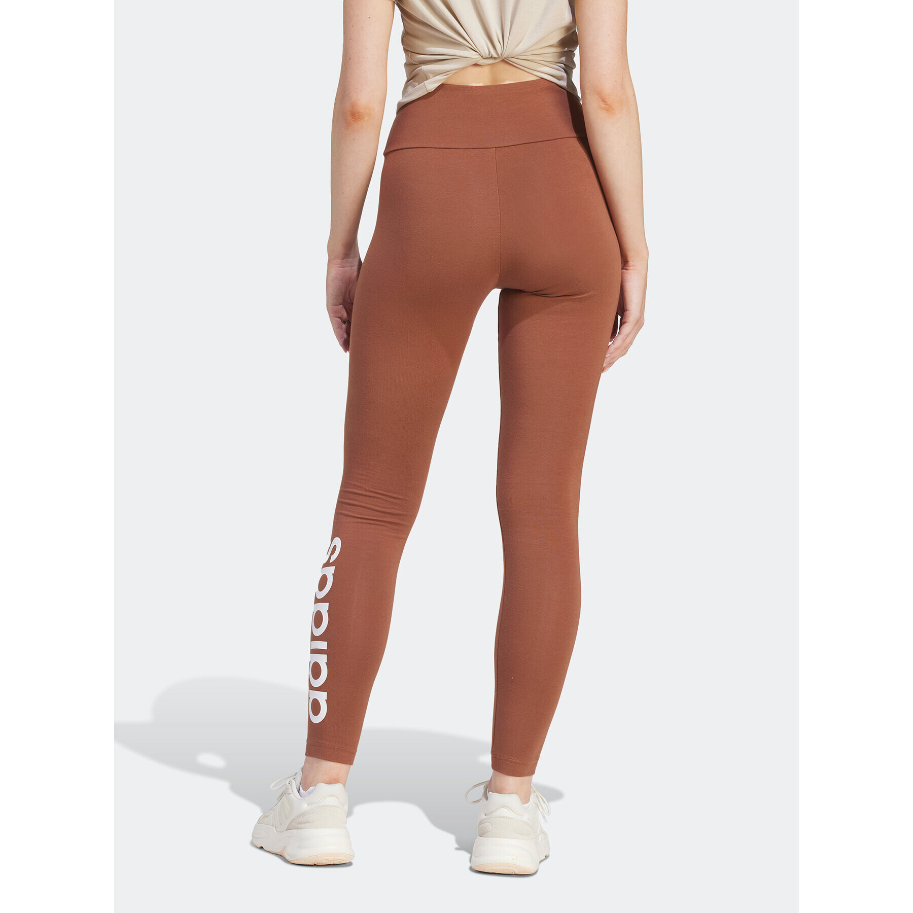 adidas Colanți ESSENTIALS HIGH-WAISTED LOGO IM2858 Maro Tight Fit - Pled.ro