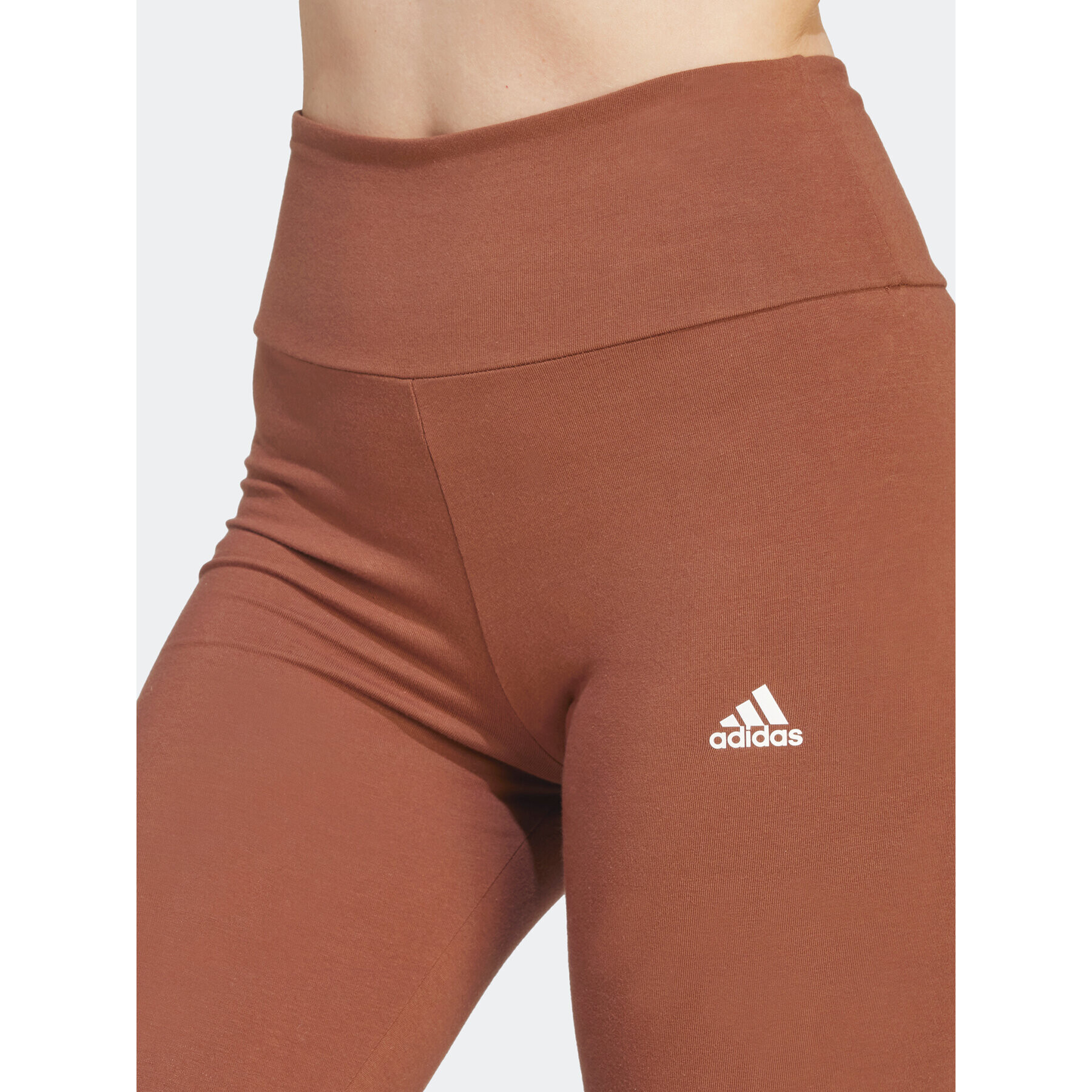 adidas Colanți ESSENTIALS HIGH-WAISTED LOGO IM2858 Maro Tight Fit - Pled.ro