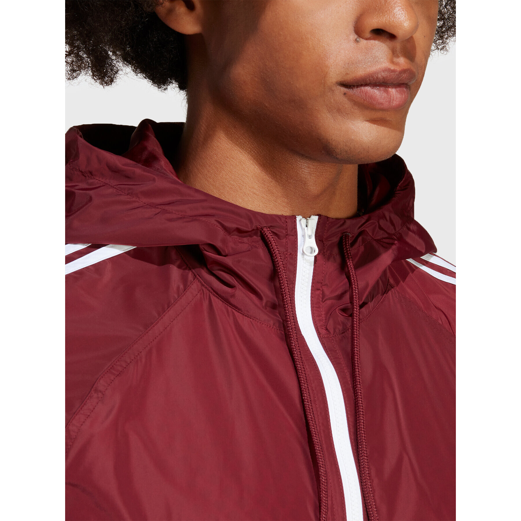 adidas Geacă de vânt Adicolor Classics Windbreaker IB9960 Roșu Loose Fit - Pled.ro