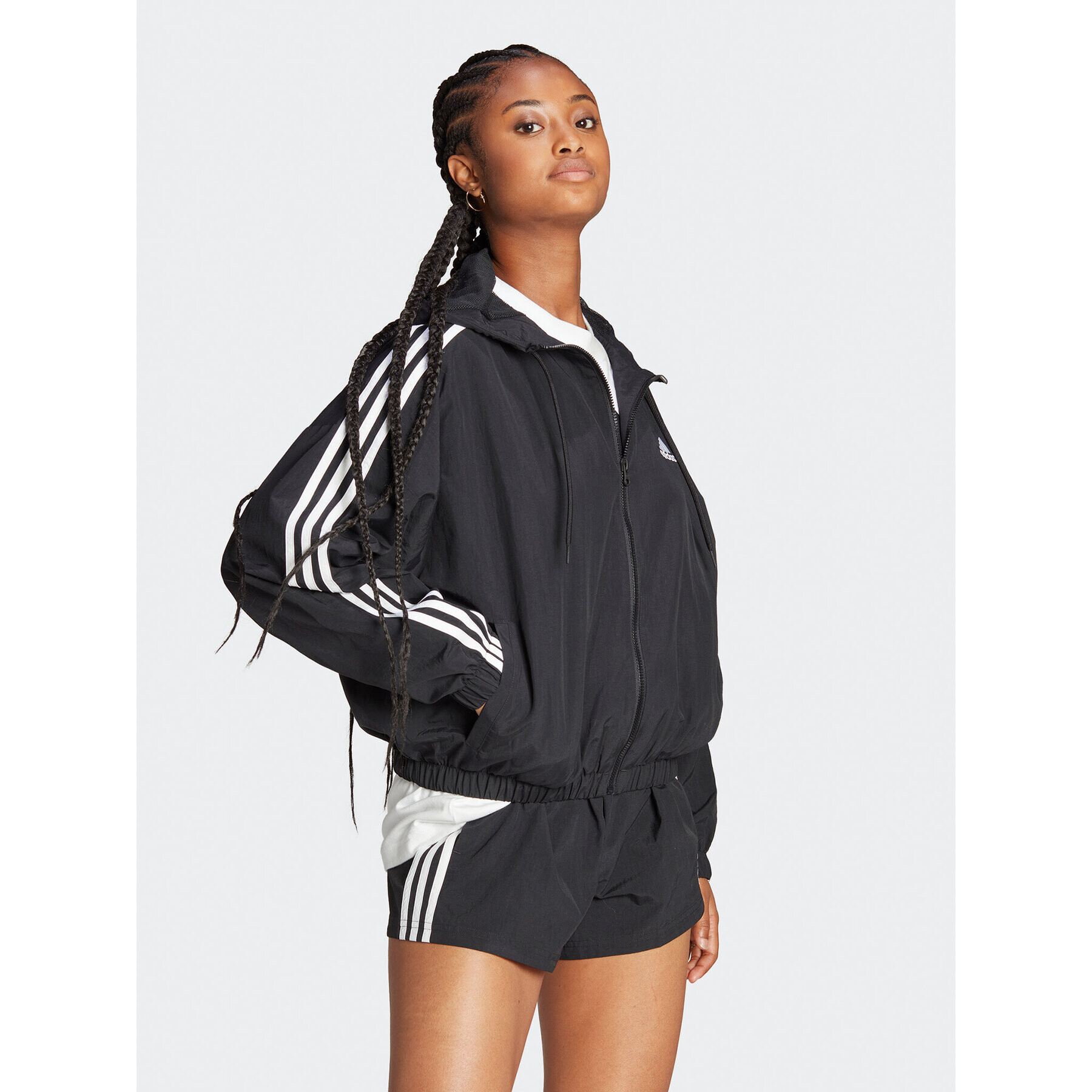 adidas Geacă de vânt Essentials 3-Stripes Woven Windbreaker HT3399 Negru Loose Fit - Pled.ro