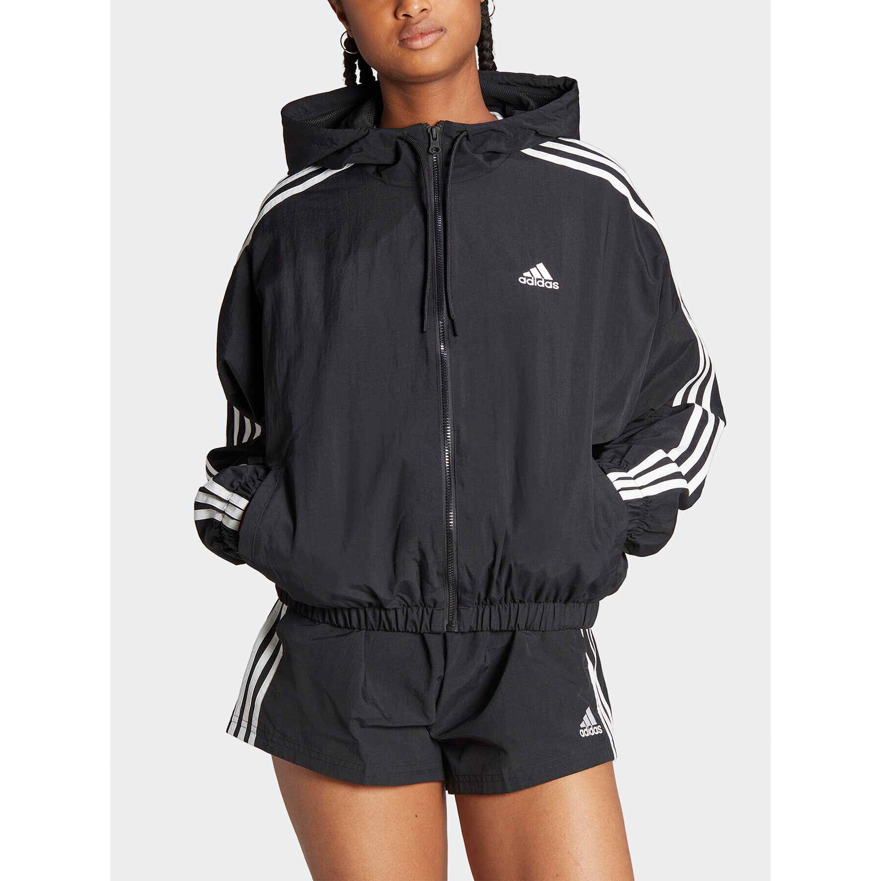 adidas Geacă de vânt Essentials 3-Stripes Woven Windbreaker HT3399 Negru Loose Fit - Pled.ro