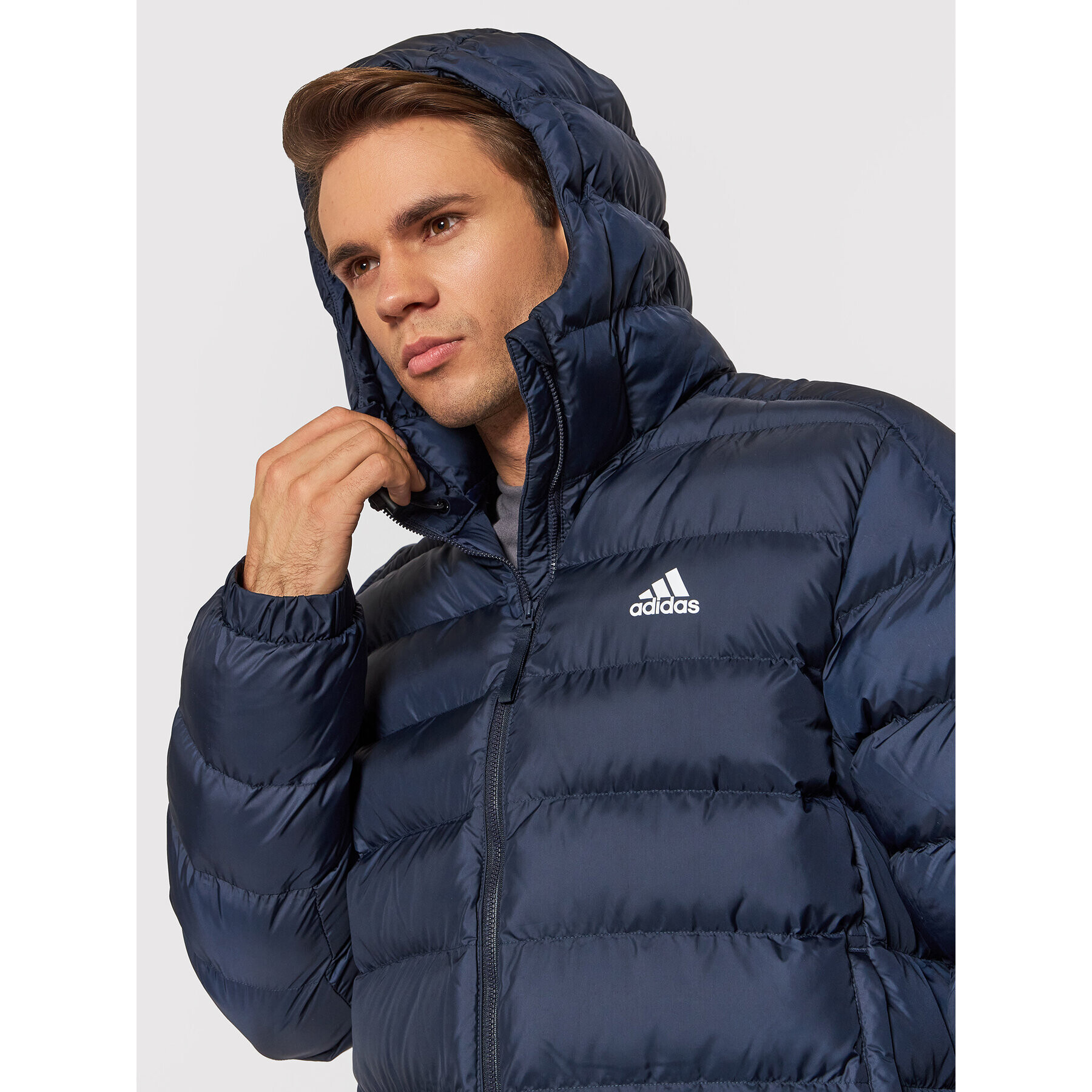 adidas Geacă din puf Itavic 3-Stripes GT1686 Bleumarin Regular Fit - Pled.ro