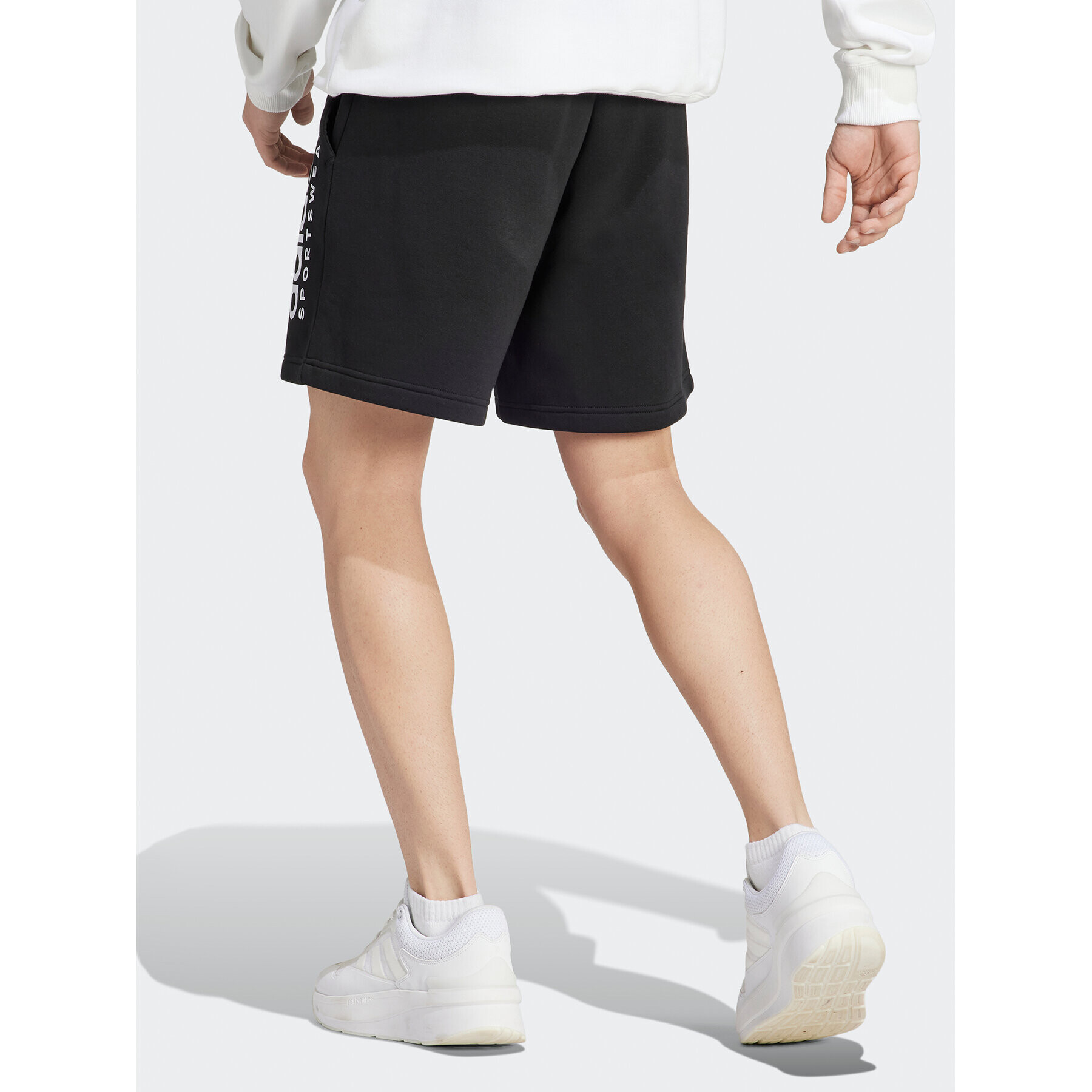 adidas Pantaloni scurți sport All SZN Fleece Graphic Shorts IC9792 Negru Regular Fit - Pled.ro