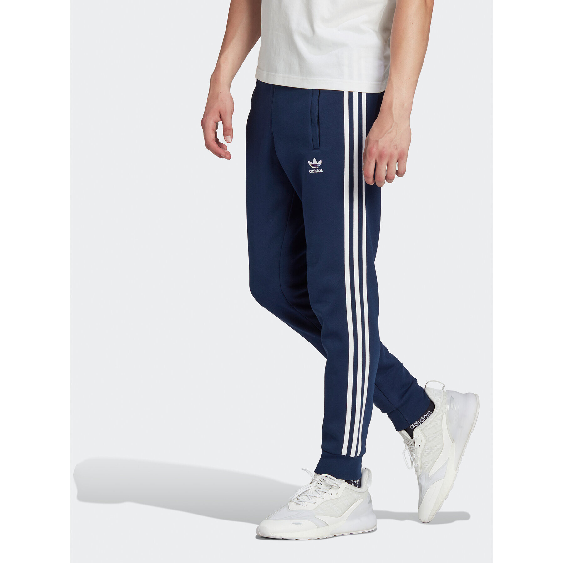 adidas Pantaloni trening adicolor Classics 3-Stripes IB1418 Bleumarin Slim Fit - Pled.ro