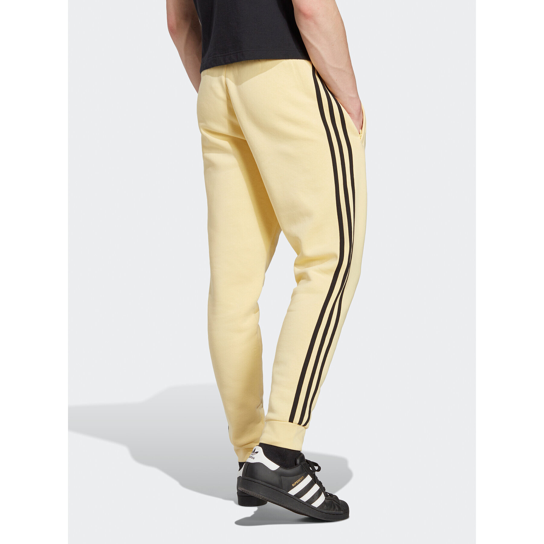 adidas Pantaloni trening Adicolor Classics 3-Stripes Joggers IA4793 Galben Fitted Fit - Pled.ro