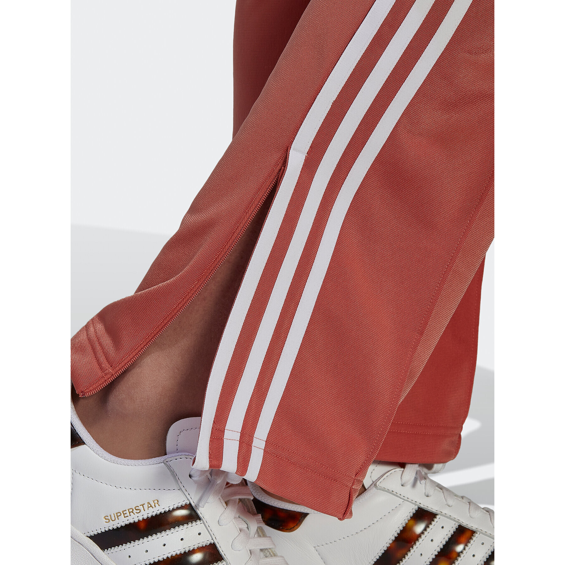 adidas Pantaloni trening adicolor Classics Firebird Primeblue HN5898 Portocaliu Regular Fit - Pled.ro