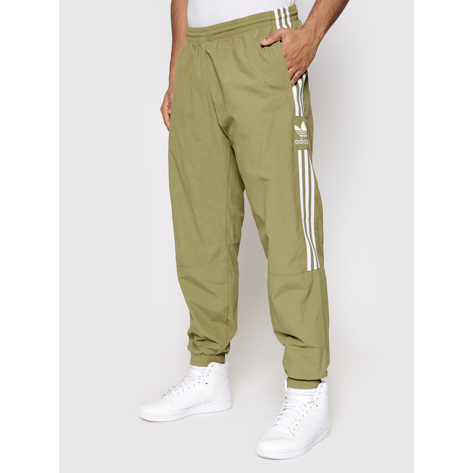 adidas Pantaloni trening adicolor Classics Lock-Up Track H41386 Verde Regular Fit - Pled.ro