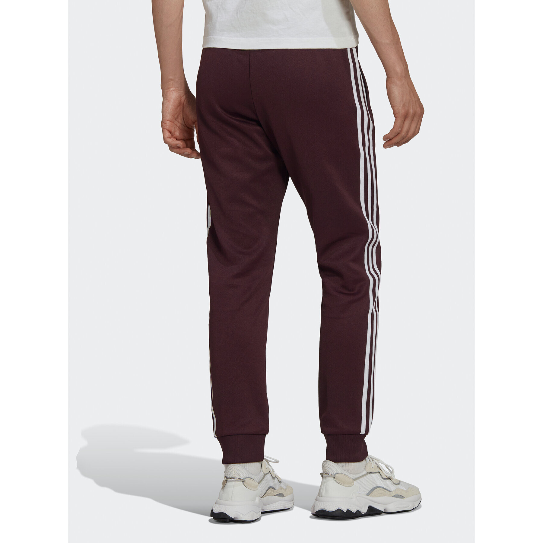 adidas Pantaloni trening ADICOLOR CLASSICS PRIMEBLUE SST Tracksuit Bottom HK7352 Roșu Slim Fit - Pled.ro