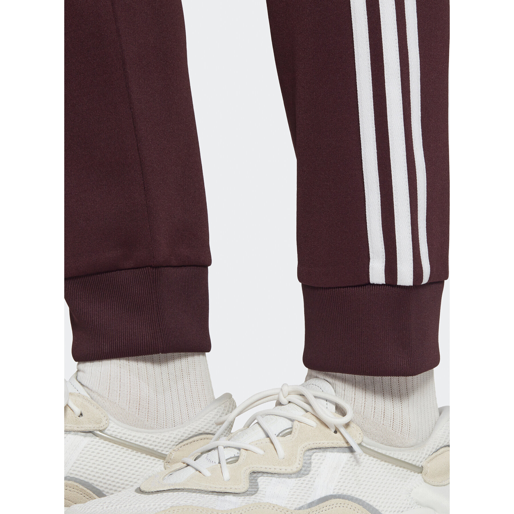 adidas Pantaloni trening ADICOLOR CLASSICS PRIMEBLUE SST Tracksuit Bottom HK7352 Roșu Slim Fit - Pled.ro