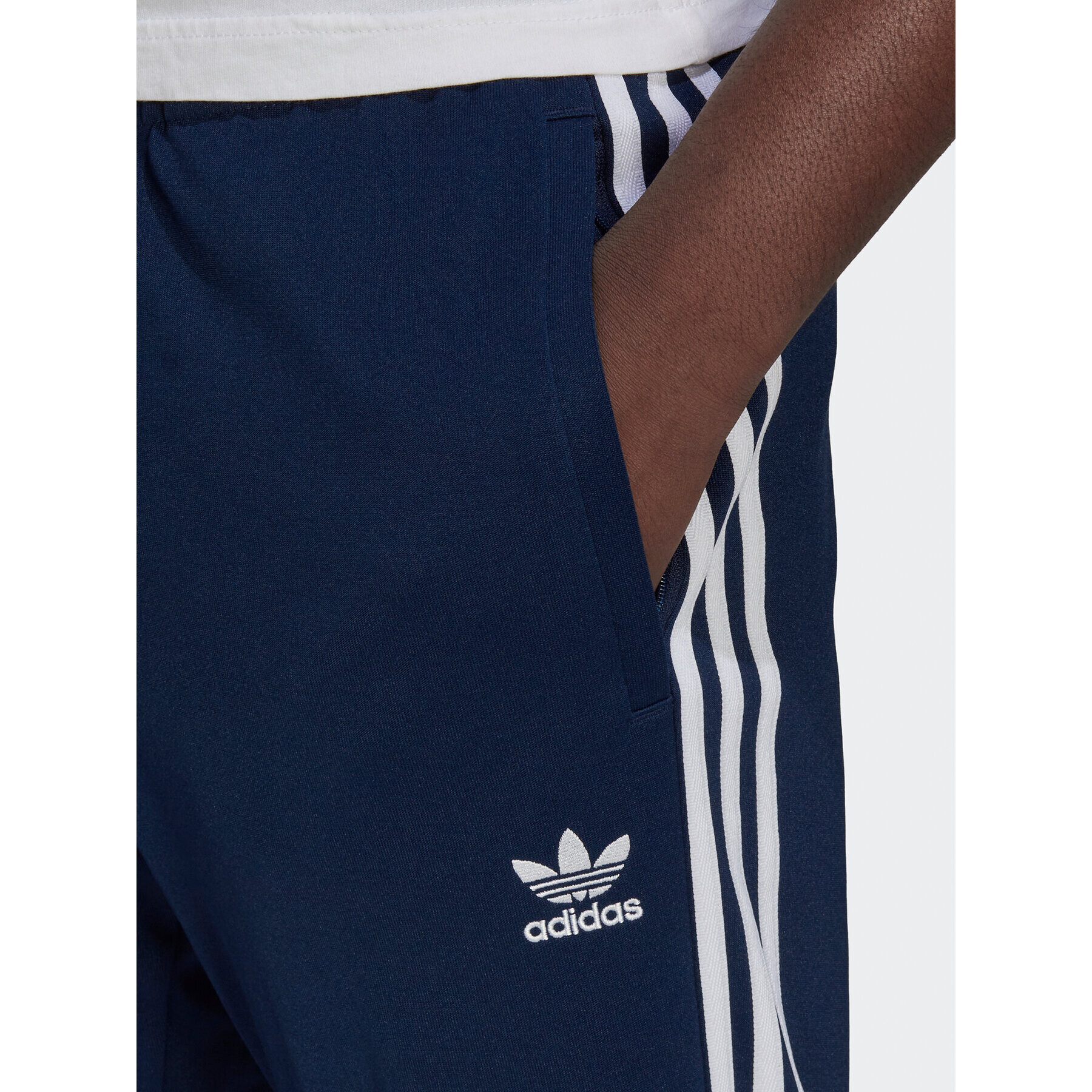 adidas Pantaloni trening ADICOLOR CLASSICS PRIMEBLUE SST Tracksuit Bottom HK7353 Albastru Slim Fit - Pled.ro