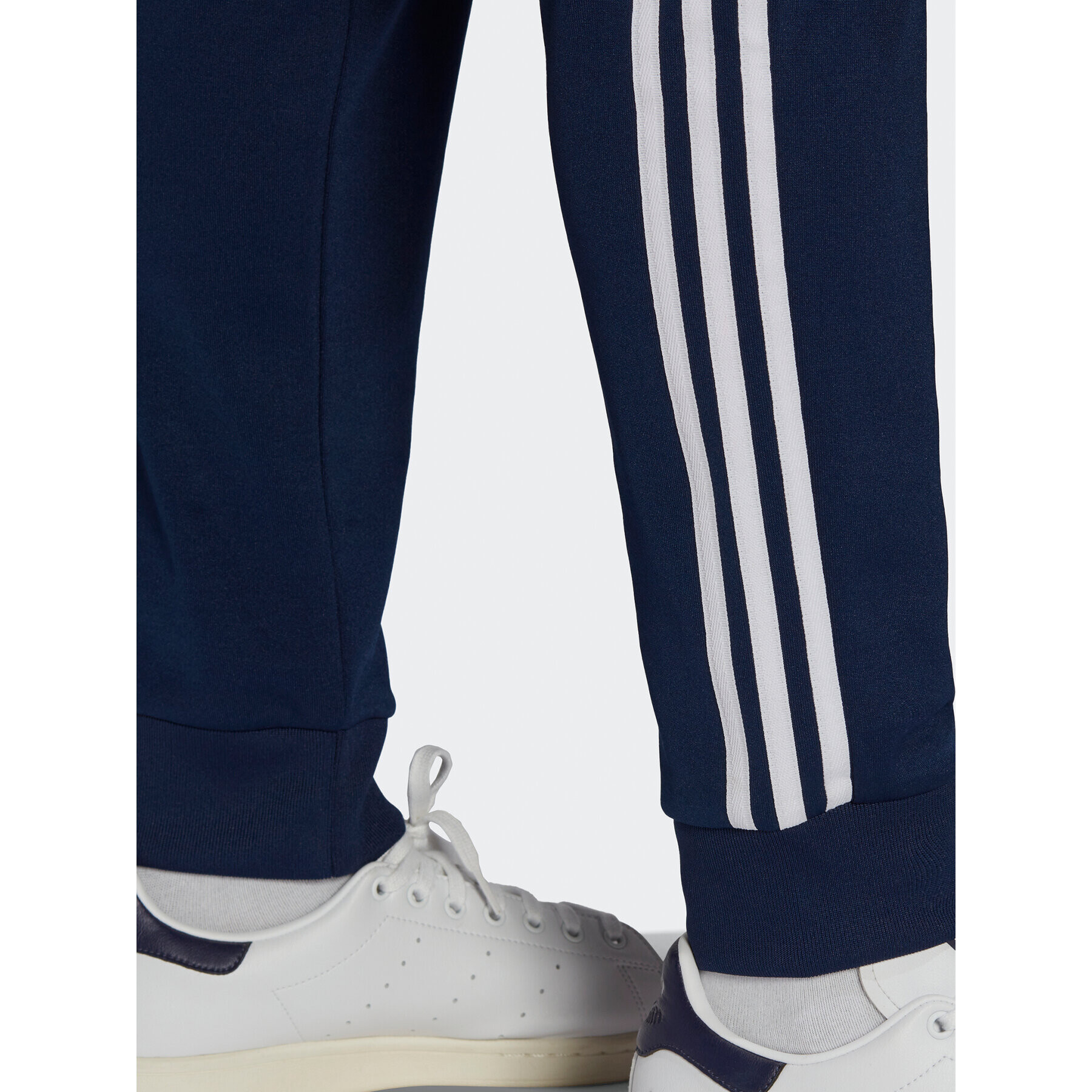 adidas Pantaloni trening ADICOLOR CLASSICS PRIMEBLUE SST Tracksuit Bottom HK7353 Albastru Slim Fit - Pled.ro