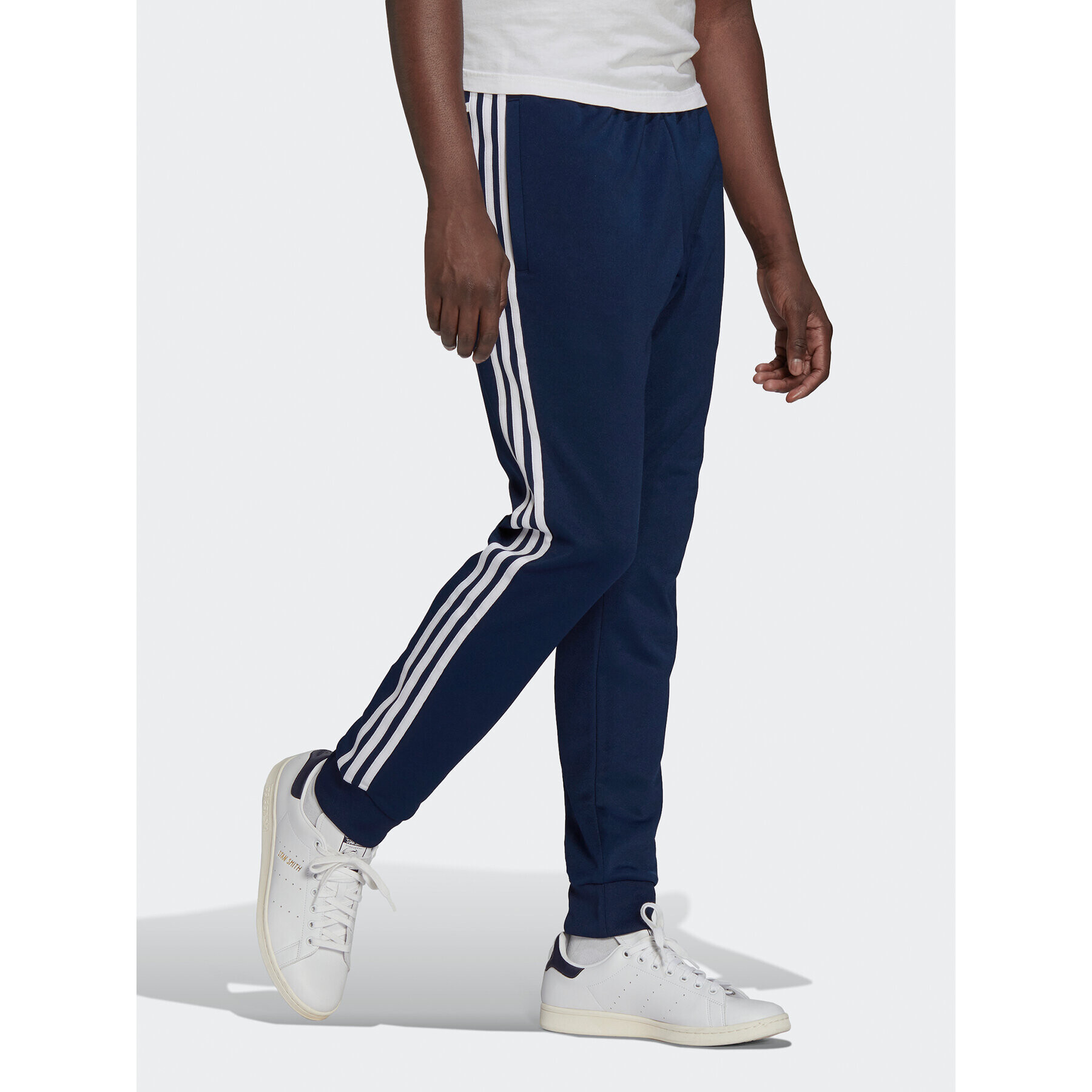 adidas Pantaloni trening ADICOLOR CLASSICS PRIMEBLUE SST Tracksuit Bottom HK7353 Albastru Slim Fit - Pled.ro