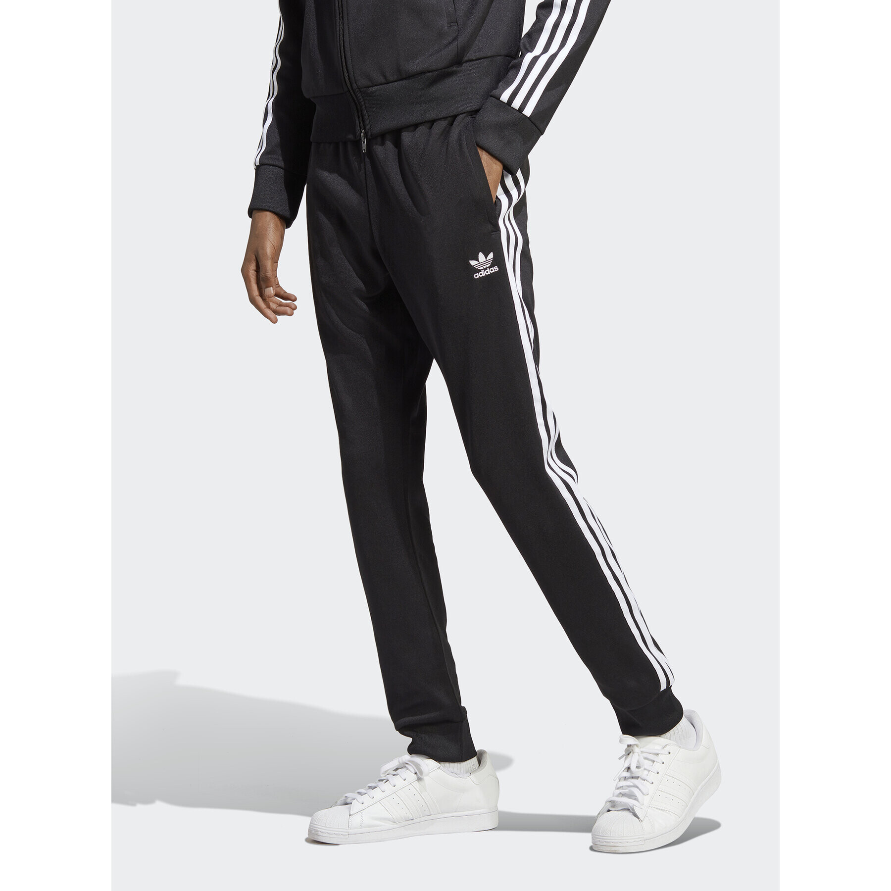 adidas Pantaloni trening Adicolor Classics SST Tracksuit Bottom IA4791 Negru Slim Fit - Pled.ro