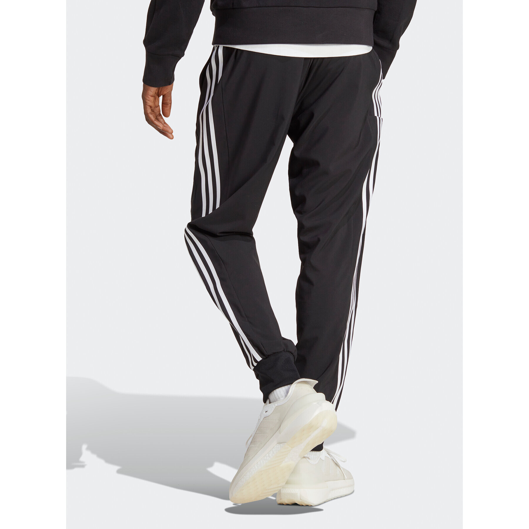 adidas Pantaloni trening AEROREADY Essentials Tapered Cuff Woven 3-Stripes Joggers IC0041 Negru Regular Fit - Pled.ro