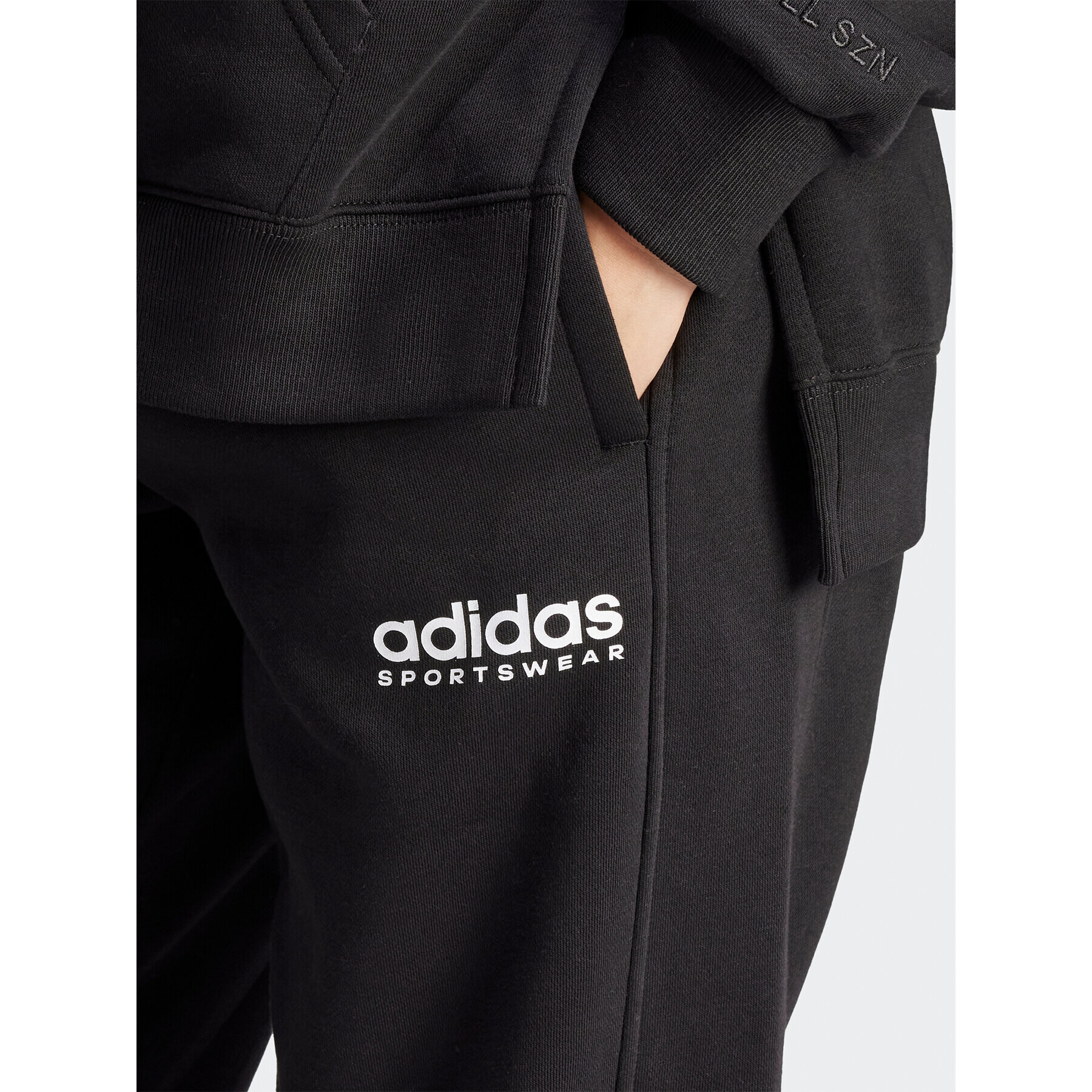 adidas Pantaloni trening All SZN Fleece Graphic HZ5802 Negru Loose Fit - Pled.ro